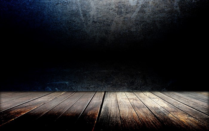 Wooden floor and dark wall