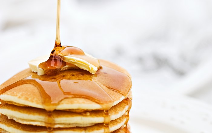 Pancakes with butter and syrup