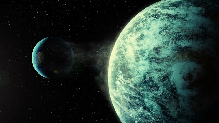 Two planets in outer space with stars