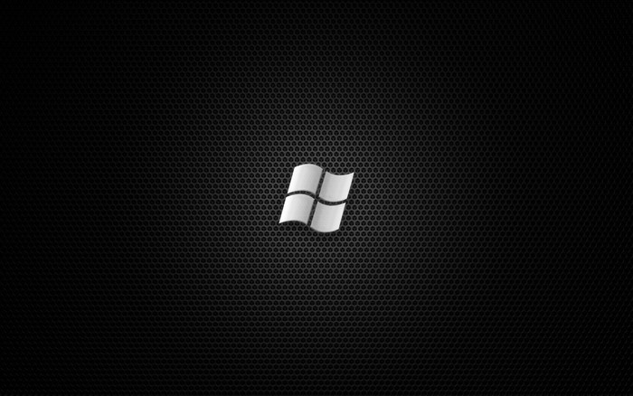 Windows 7 logo on black perforated background