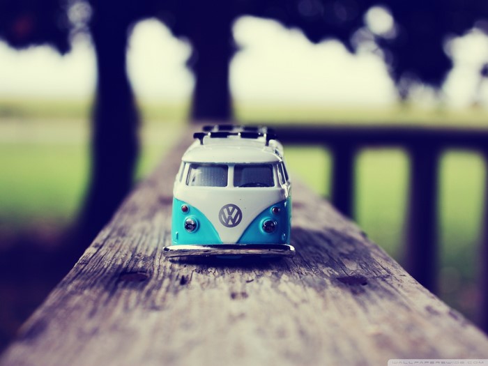 Toy Volkswagen Bus on a wooden surface