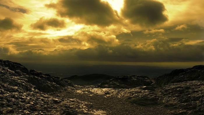 Rocky mountain landscape with dramatic clouds