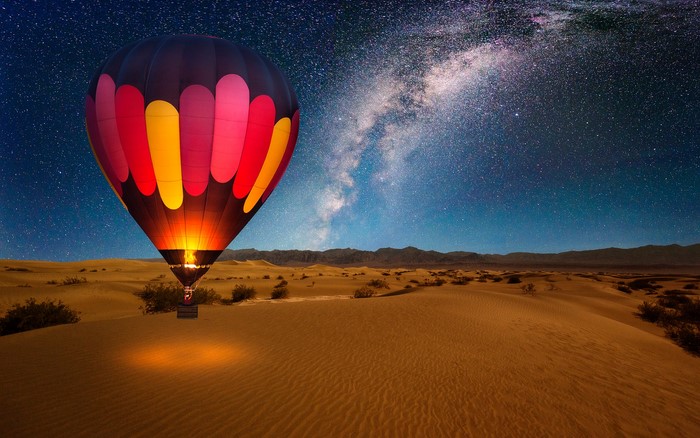 Hot Air Balloon Over Desert Under Milky Way