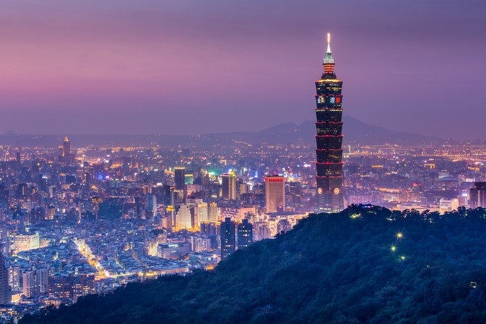 Taipei 101 skyscraper in Taipei cityscape at dusk