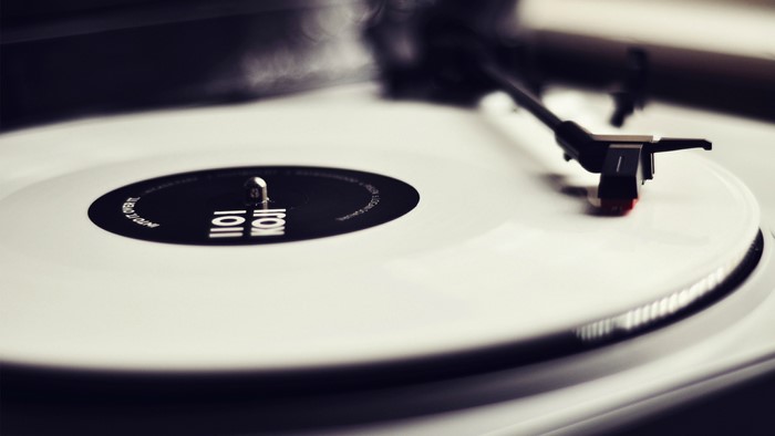White vinyl record on a turntable