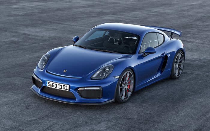 Blue Porsche Cayman GT4 on asphalt