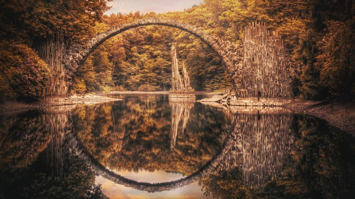 Rakotzbrücke Devil's Bridge in autumn forest