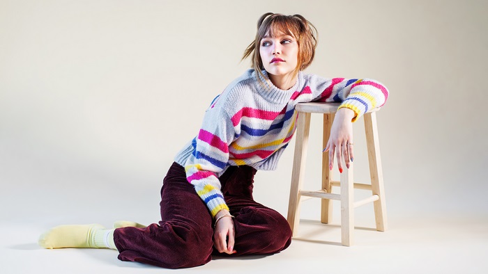 Grace Vanderwaal in a striped sweater