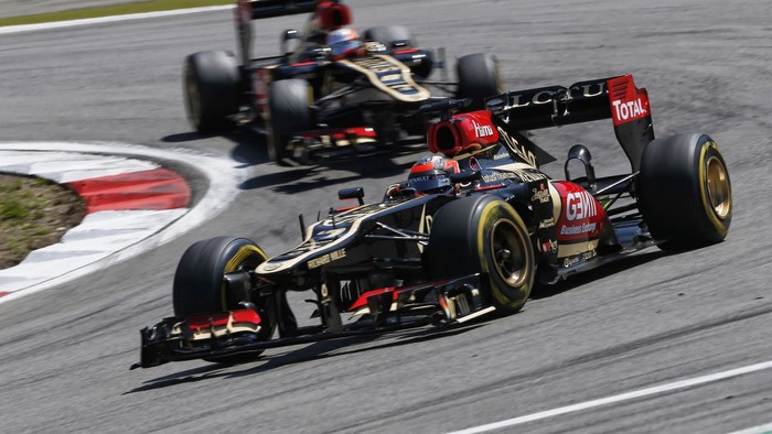 Formula 1 race cars on a track