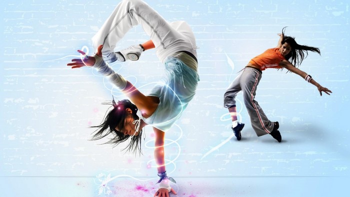 Two women dancing with light effects