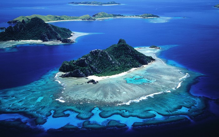 Aerial view of tropical islands and coral reefs