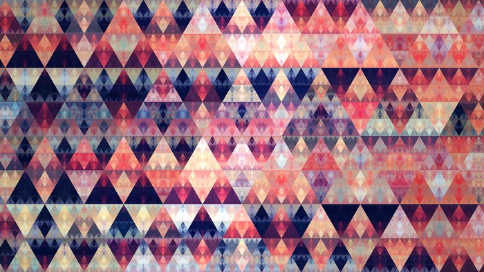 Abstract geometric pattern with triangles in warm and cool colors