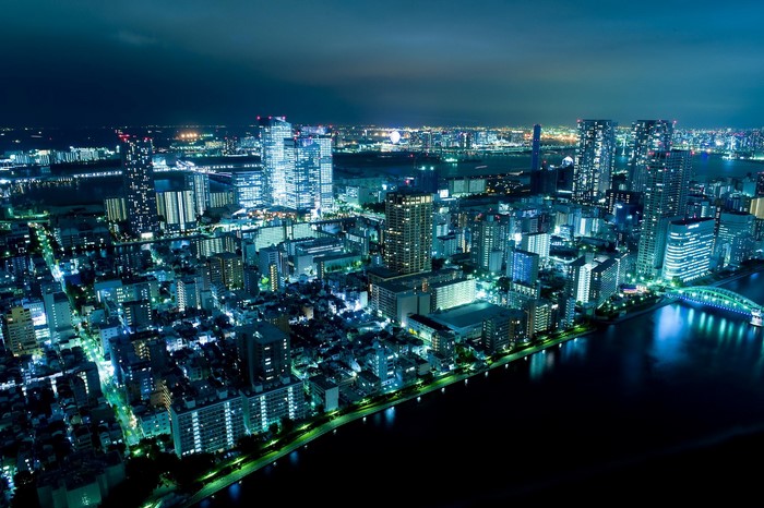 Aerial view of a city skyline at night