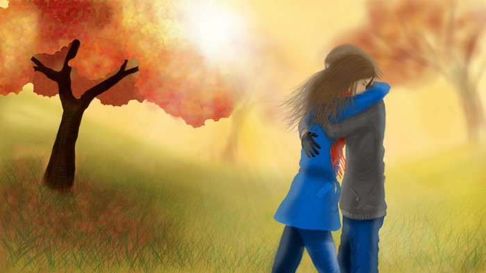 Couple hugging in autumn park