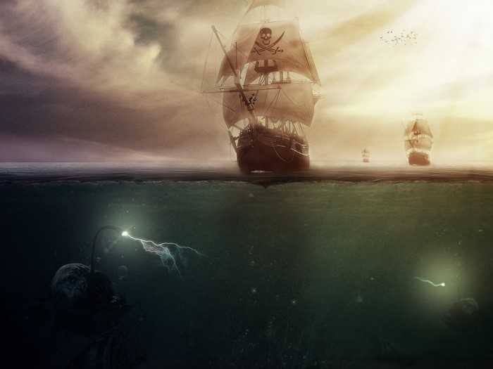Pirate ships sailing on the ocean with underwater creatures