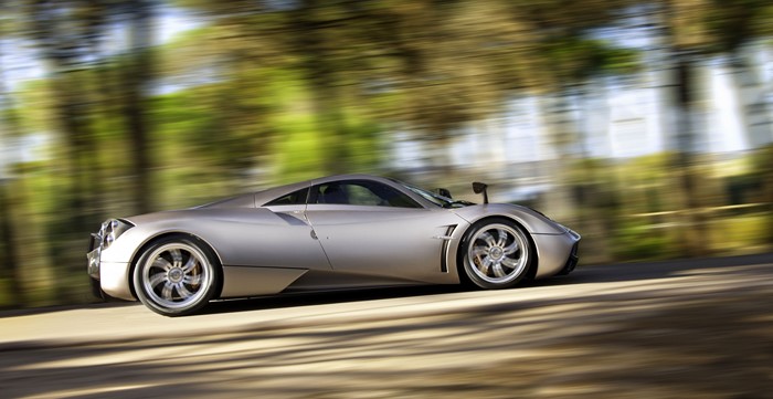 Pagani Huayra driving on a road