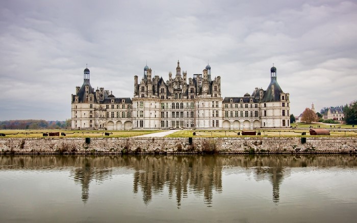 Chateau de Chambord castle reflected in water