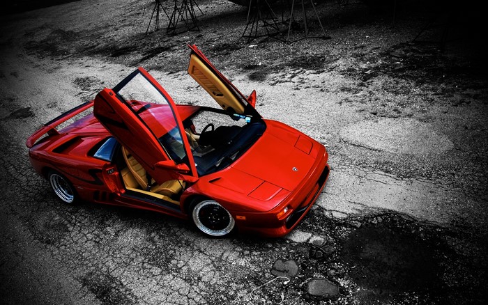 Red Lamborghini Diablo with doors open