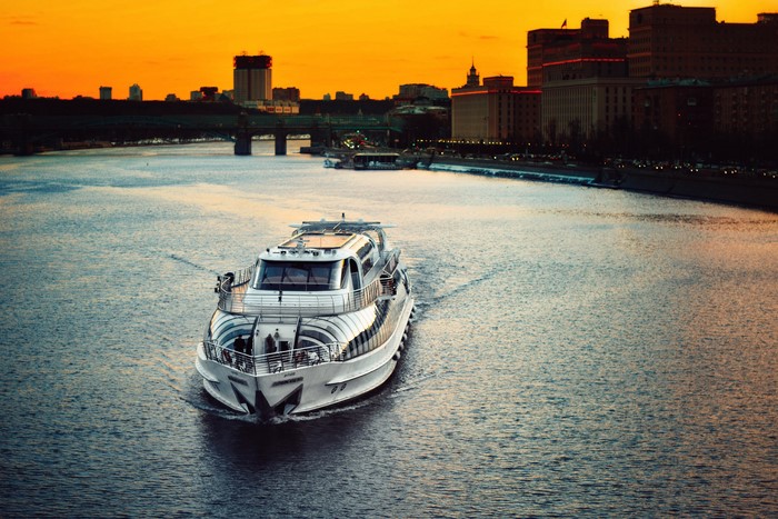 Boat on a river in Russia at sunset