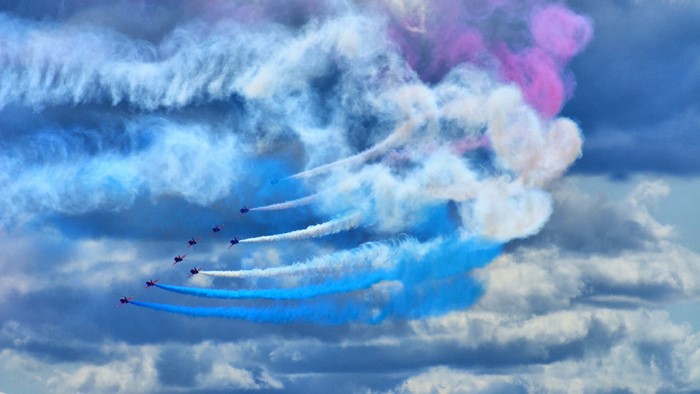 Air Show with Red Arrows and Smoke Trails