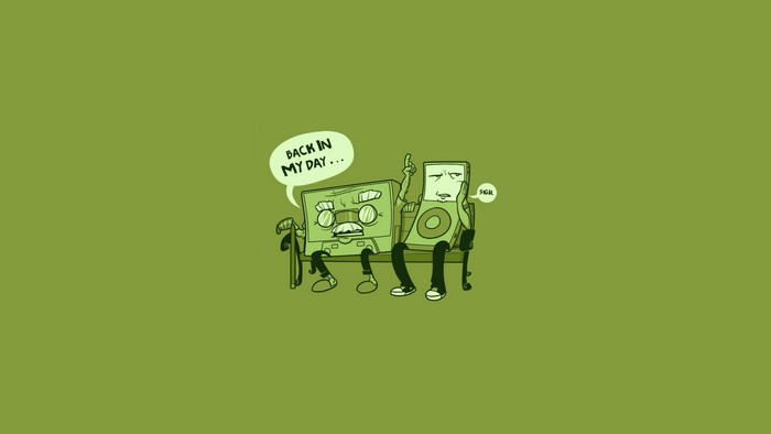 Cassette tape and iPod sitting on a bench