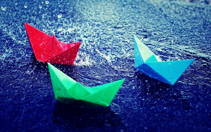Paper boats in the rain