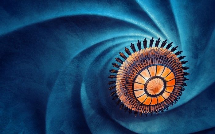 Abstract blue swirl with a circular orange object