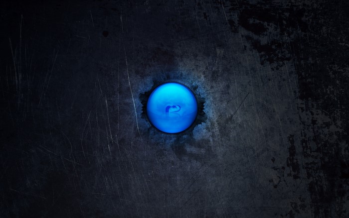 Abstract dark background with blue glowing circle