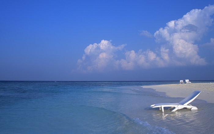 Beach chairs on a tropical beach