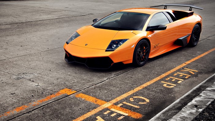 Orange Lamborghini Murcielago LP-670 on asphalt