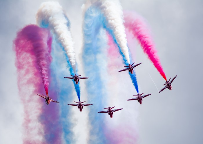 Air Show with Red Arrows and Smoke Trails