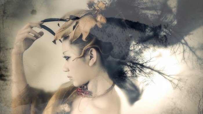 Asian woman with floral and tree branch headdress