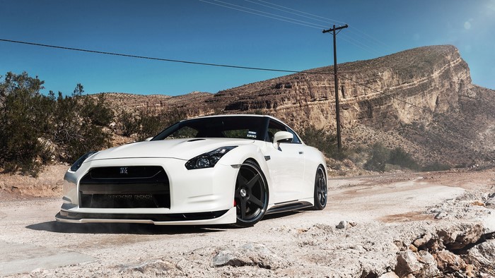 White Nissan GT-R in a desert landscape