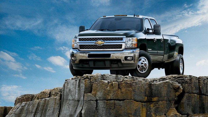 Dark Green Chevrolet Silverado Heavy Duty Truck on Rocks
