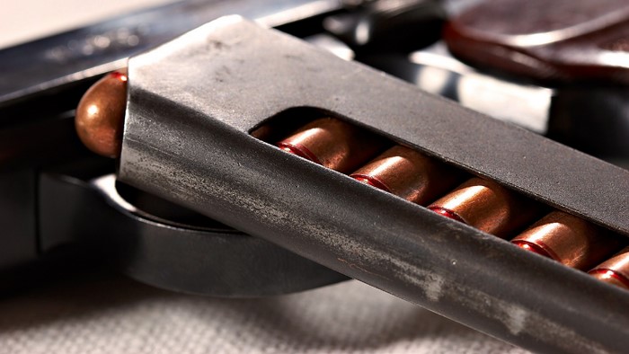 Close-up of a gun magazine with bullets