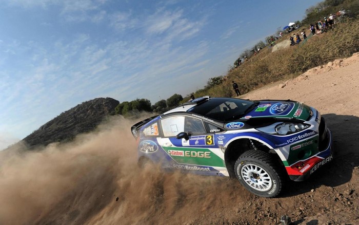 Ford Fiesta rally car on a dirt track