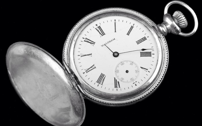 American Waltham pocket watch with open cover