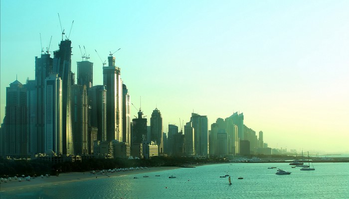 Dubai skyline with skyscrapers and boats
