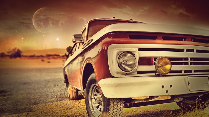 Vintage truck in a surreal desert landscape