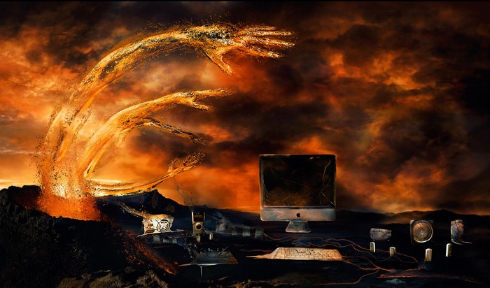 Digital Apocalypse: Firey Hands Erupting from Volcano Overlooking Computer Equipment