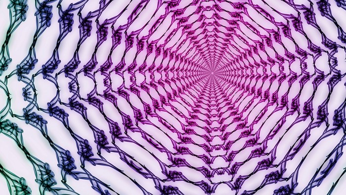 Abstract kaleidoscopic pattern with purple and green hues