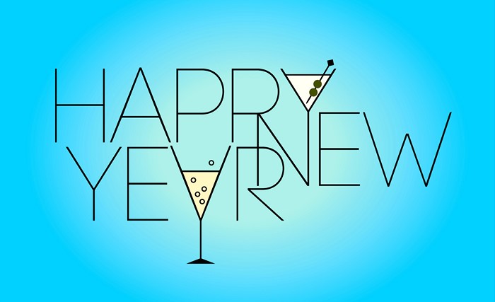 Happy New Year text with cocktails