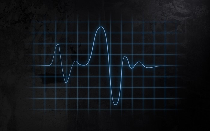Abstract blue waveform on a grid