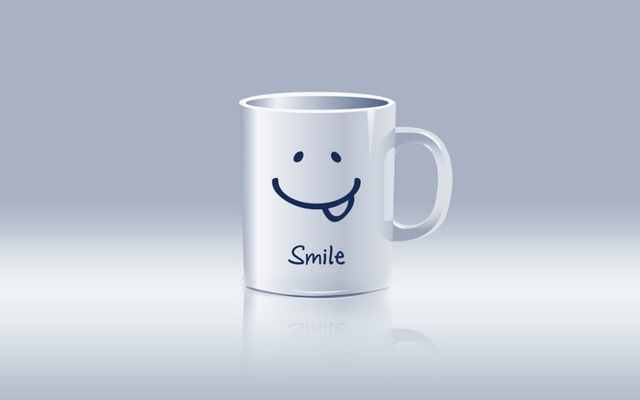 White mug with a smiley face and the word "Smile"