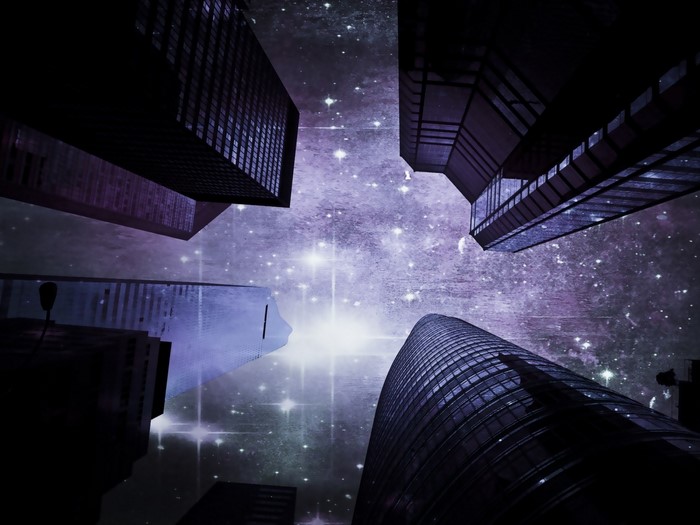 Skyscrapers against a starry night sky