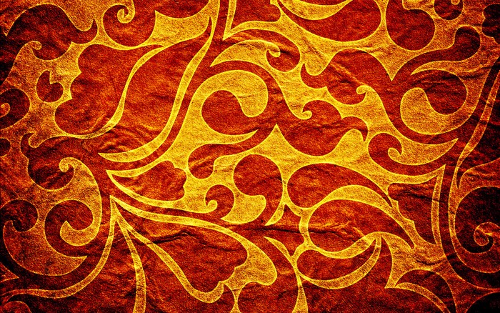 Abstract golden floral pattern on textured background