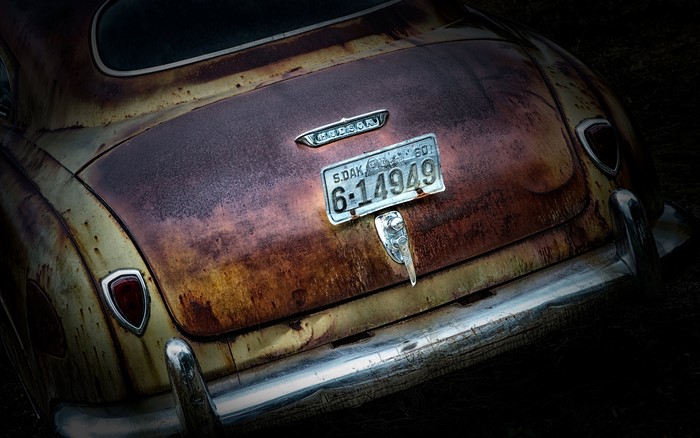 Rusted Hudson car with South Dakota license plate