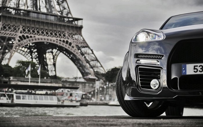 Car in front of the Eiffel Tower in Paris