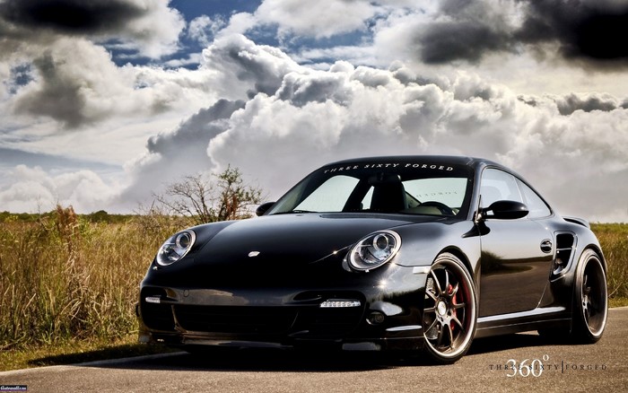 Black Porsche 997 TT on a Road