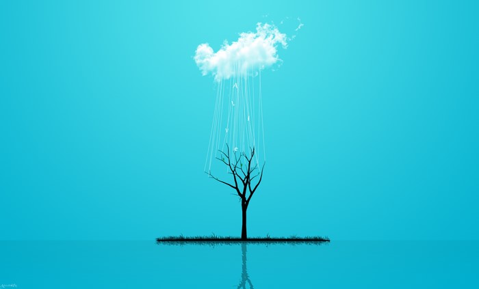 Cloud raining letters on a tree silhouette
